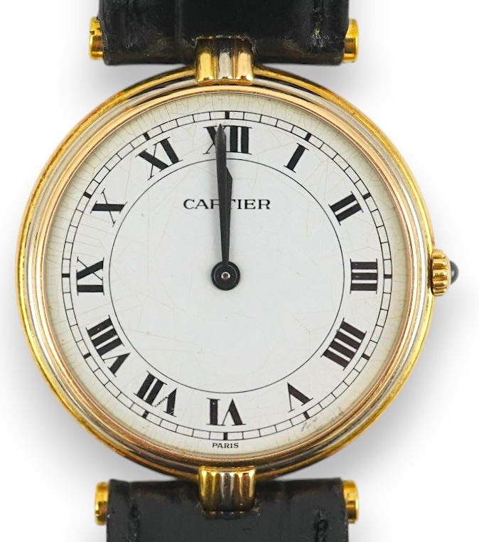 A modern 18ct gold Cartier Vendome quartz wrist watch, on an associated leather strap